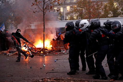 Political protests in Paris, empty space between protesters and the police